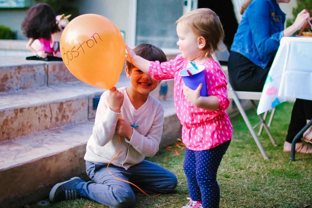 Boston with his orange balloon